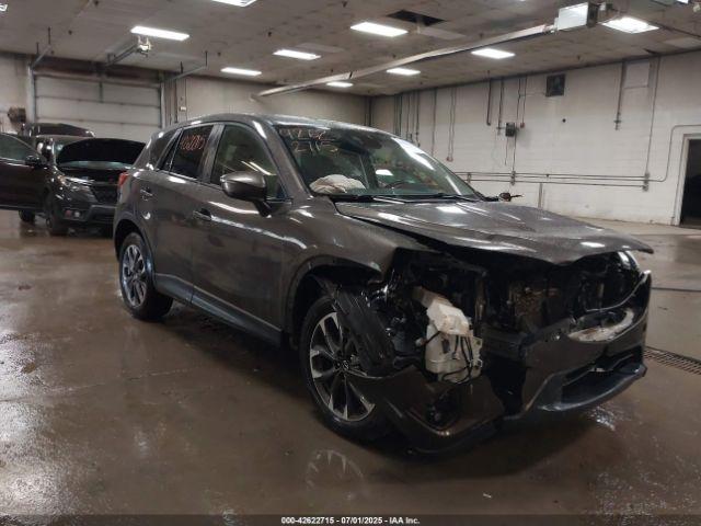  Salvage Mazda Cx